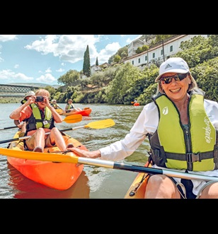 Scenic guests kayaking on the Pinhão River