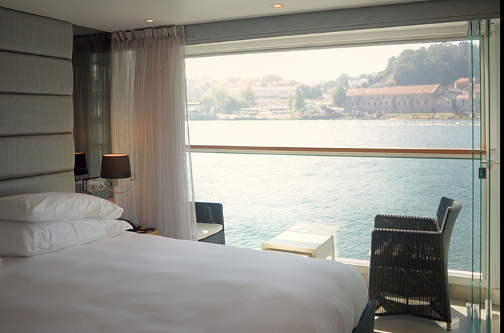 Floor to ceiling windows in the standard balcony suite on Scenic Azure 