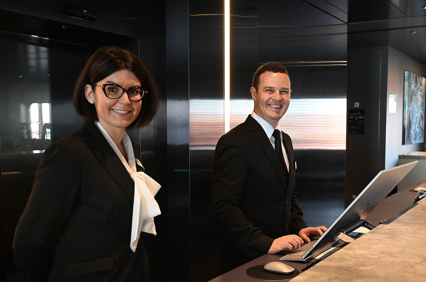 Two receptionists on board Scenic Eclipse
