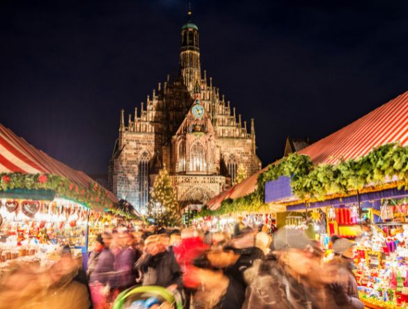 Christmas Markets in the night with a Cathedral in the background