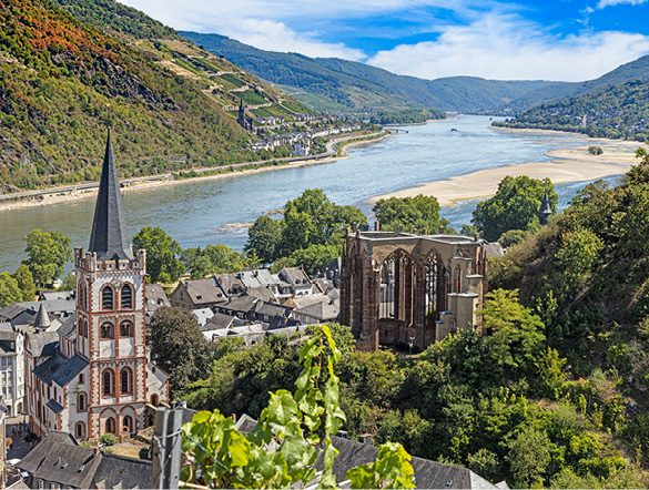 Low water on the Rhine river with a town overlooking it