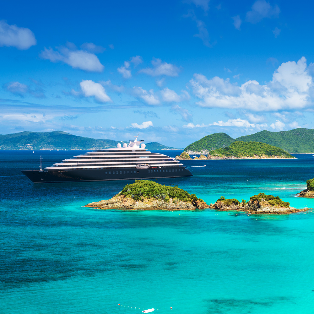Scenic Eclipse sailing in the Caribbean surrounded by islands