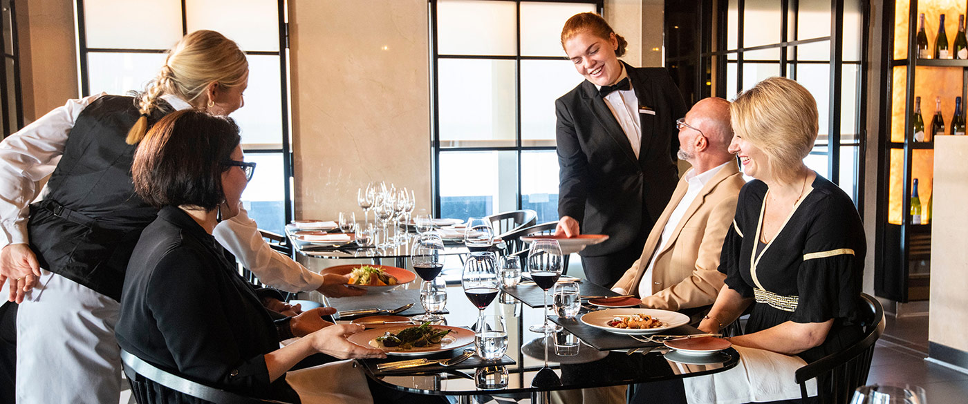 Guests dining on board Scenic Eclipse